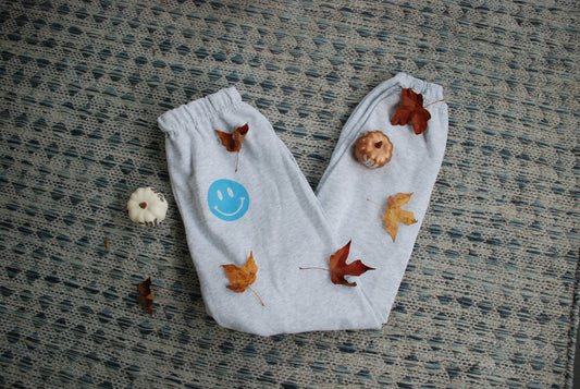 Blue Smiley Face Sweatpants